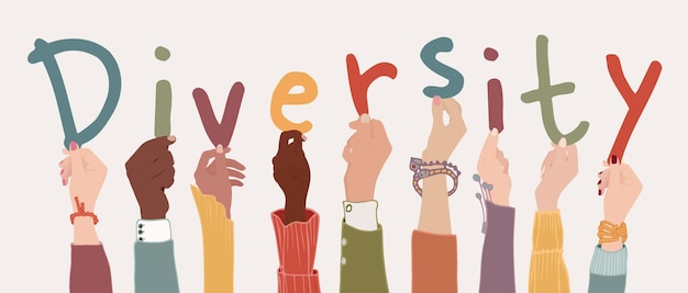 Grupo de personas multiculturales que sostienen las letras que forman el texto Diversidad.