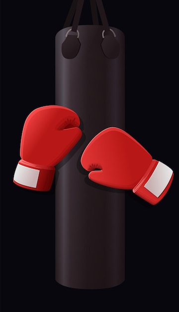 Guantes de boxeo rojos y pera Un par de guantes de boxeo rojos