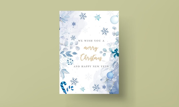 Hermosa plantilla de tarjeta de navidad con adornos navideños blancos y azules