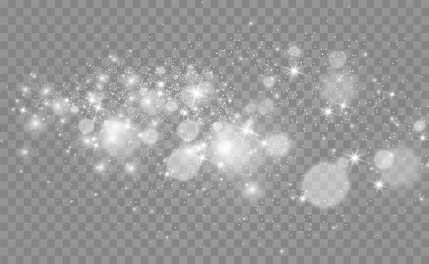 Hermosas chispas brillan con una luz especial. brilla sobre un fondo transparente. Resumen de Navidad.
