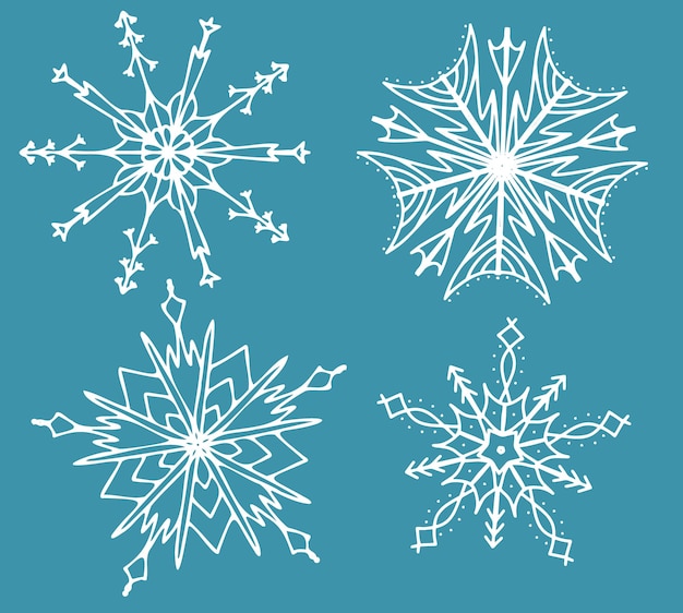 Hermoso juego de copos de nieve blancos sobre un fondo azul para el diseño invernal de Navidad Año Nuevo