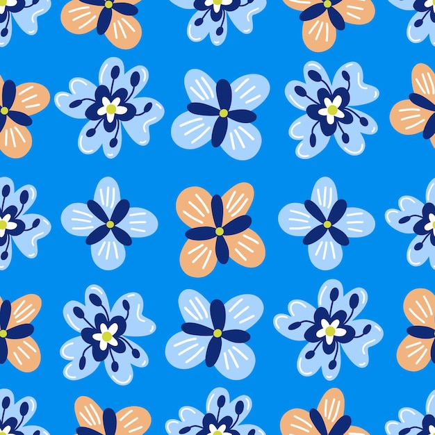 Un hermoso patrón sin costuras con flores sobre un fondo azul.