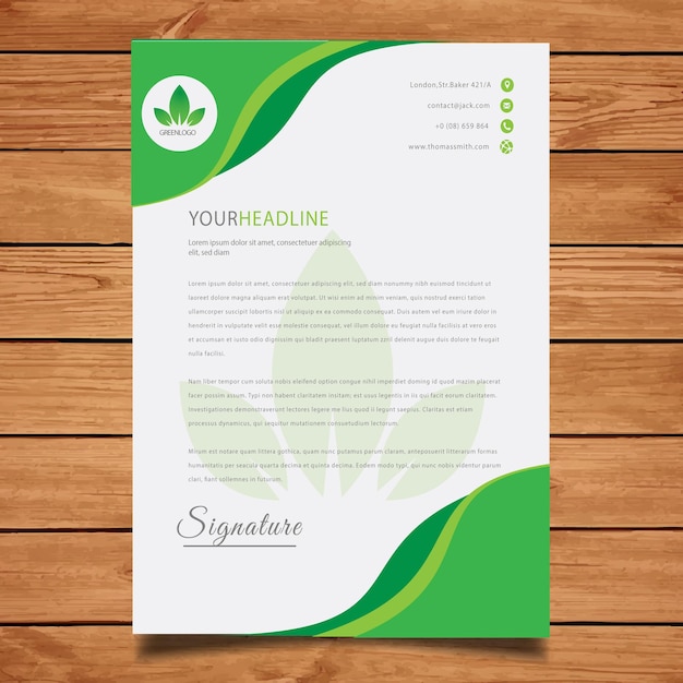 una hoja verde en él está en un fondo de madera papel de carta de la compañía moderna con Professio