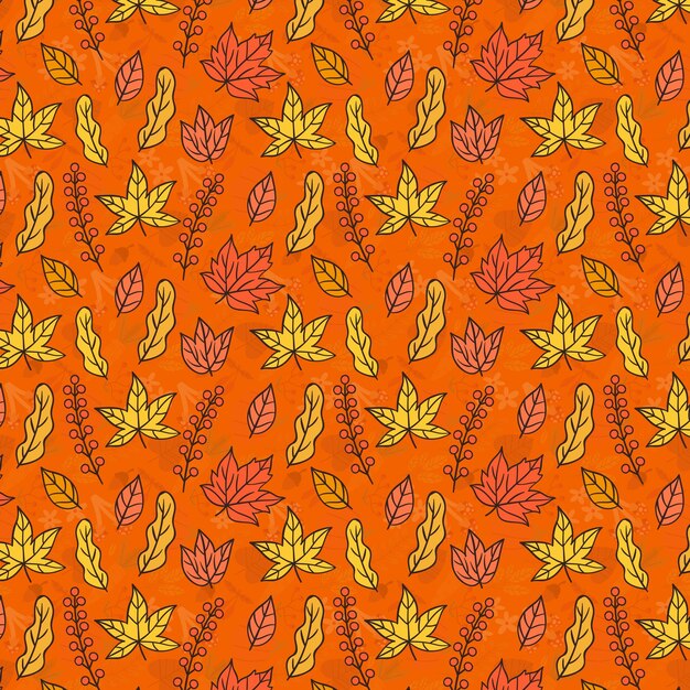 hojas amarillas sobre un fondo naranja