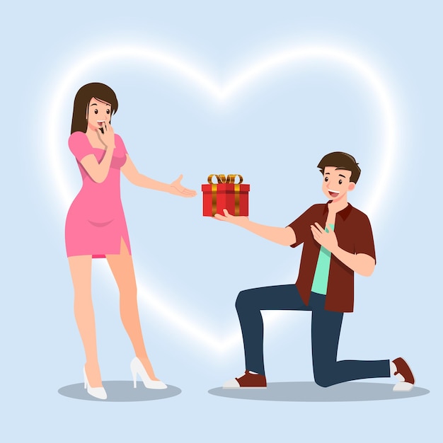 Un hombre arrodillado para dar un regalo a las mujeres. el diseño en concepto romántico de personas que se dan amor para el festival del amor como el día de san valentín.