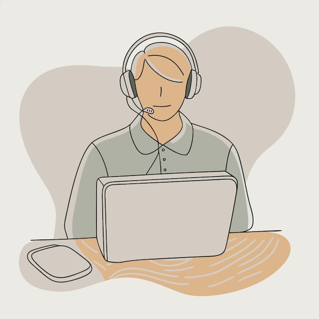 un hombre con auriculares y una computadora portátil en su escritorio
