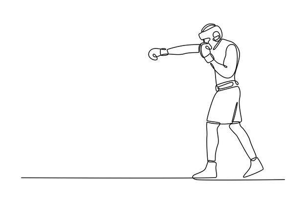 hombre boxeador con protector de cabeza y guantes de boxeo practicando para la pelea