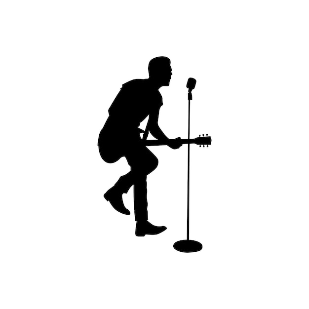 un hombre está cantando frente a un micrófono que dice la palabra en él
