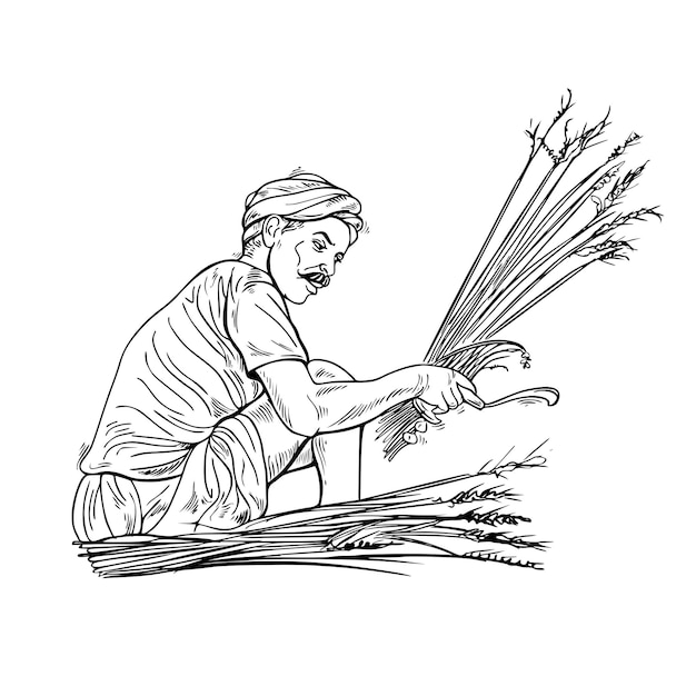 Un hombre está trabajando en un campo con un montón de trigo.