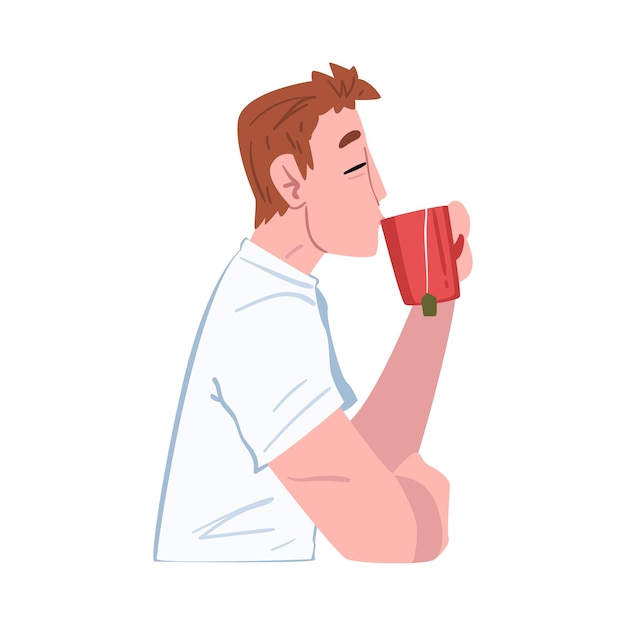 Hombre joven bebiendo té o café hombre disfrutando de beber una bebida caliente vista lateral gente actividad diaria