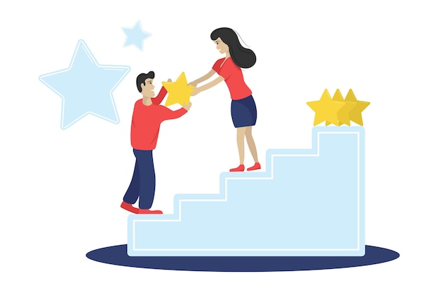 El hombre y la mujer se dan una estrella para dar retroalimentación de pie en las escaleras