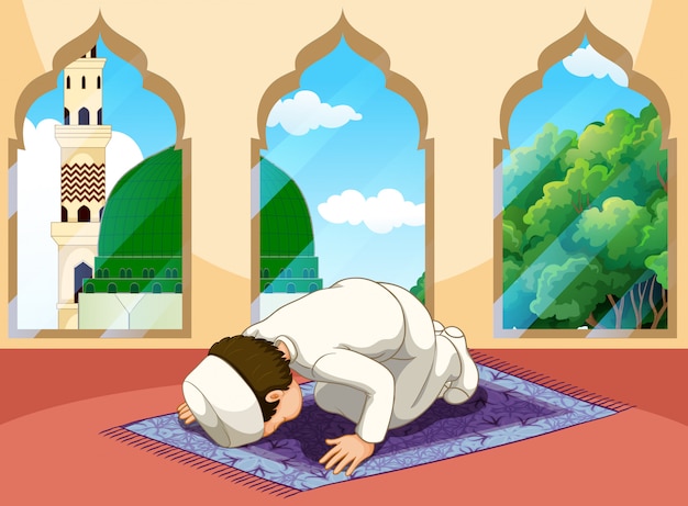 Un hombre musulmán reza en la mezquita.