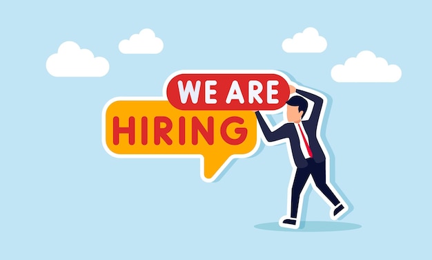 Un hombre de negocios que organiza el texto WE ARE HIRING ilustración de un puesto de trabajo abierto o anuncio de vacante con fines de contratación