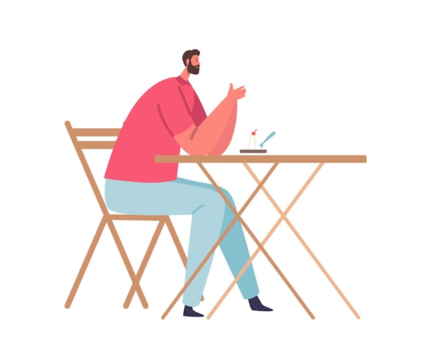 Hombre sentado en el café de la calle y se entrega a un trozo de pastel disfrutando del momento El personaje masculino promueve la relajación