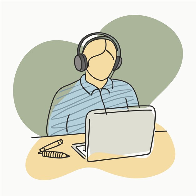 un hombre se sienta en un escritorio con una computadora portátil y auriculares