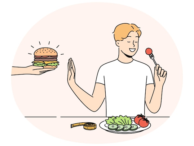 Hombre sonriente comer basura de ensalada de hamburguesa