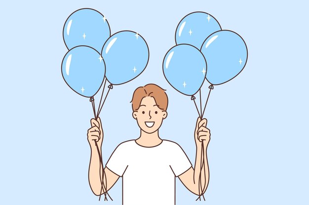 Hombre sonriente con globos en las manos