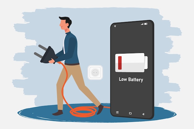 Hombre sosteniendo un cable de cargador de teléfono móvil y un símbolo de batería baja en la pantalla del teléfono