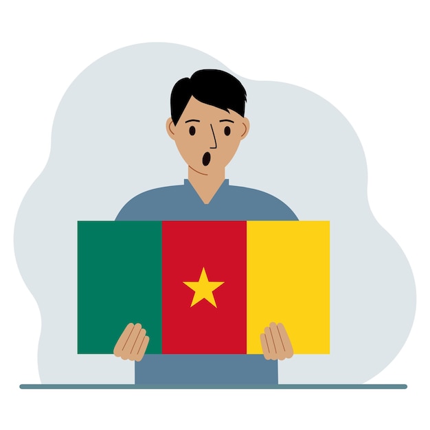 Vector un hombre sostiene la bandera de camerún en sus manos el concepto de fiesta nacional de demostración o patriotismo nacionalidad