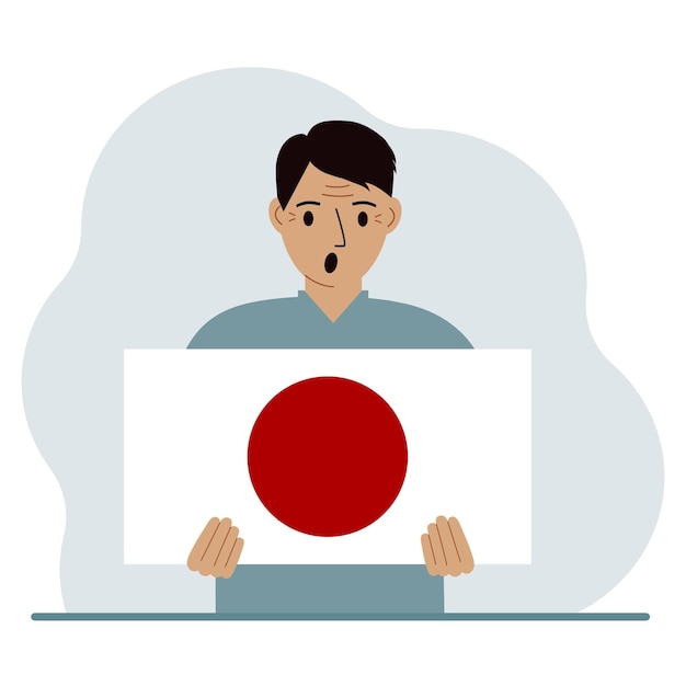 Vector un hombre sostiene la bandera de japón en sus manos el concepto de fiesta nacional de demostración o patriotismo nacionalidad
