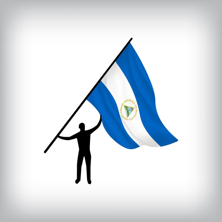Vector un hombre sostiene la bandera de nicaragua en el aire bandera vectorial agitando bandera realista del día nacional