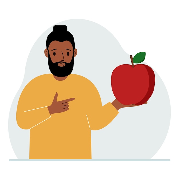 Vector un hombre sostiene una manzana fresca y roja en la mano el hombre come una manzana concepto de comida saludable