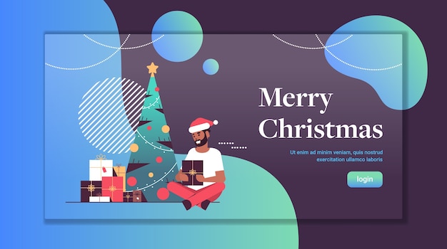 Hombre sujetando la caja de regalo feliz navidad feliz año nuevo celebración navideña concepto afroamericano chico vistiendo gorro de Papá Noel sentado cerca de abeto espacio de copia plana de longitud completa vector horizontal illus