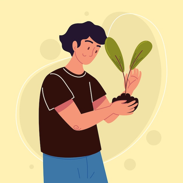 Hombre sujetando una planta