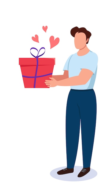 Un hombre tiene una caja de regalo en sus manos con corazones.