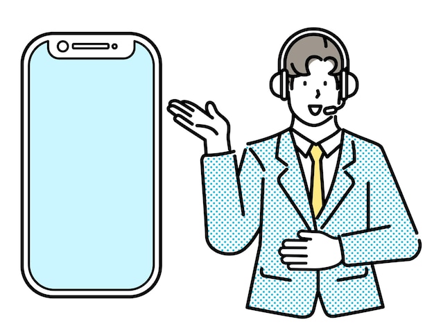 Un hombre con traje y auriculares se para al lado de un teléfono grande.