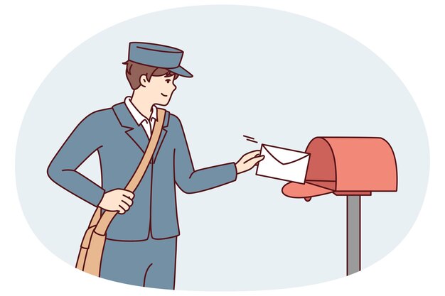 Hombre en uniforme de cartero lanza una carta de papel a un buzón de metal ubicado en la calle