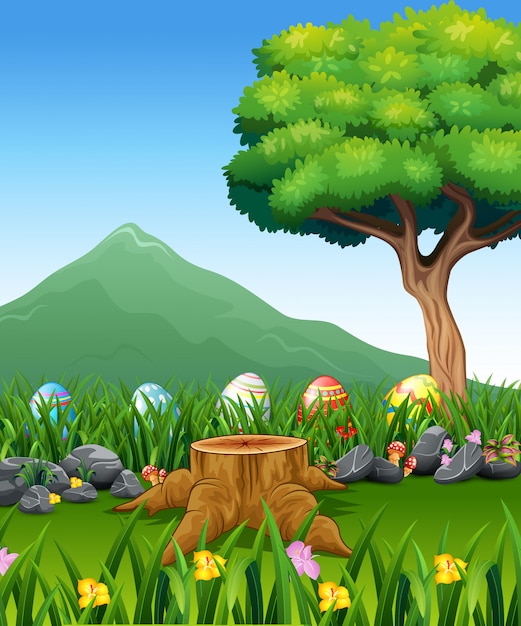 Huevos de Pascua coloridos en hierba verde con paisaje hermoso