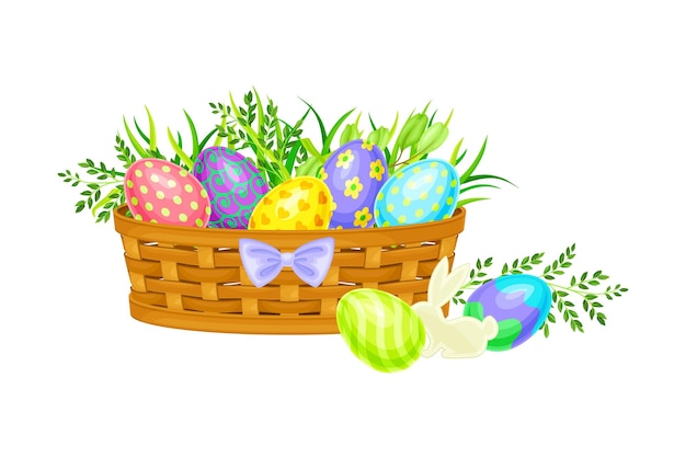 Huevos de Pascua pintados o en papel o huevos de pascua descansados en una canasta de mimbre en ilustración vectorial de hierba verde