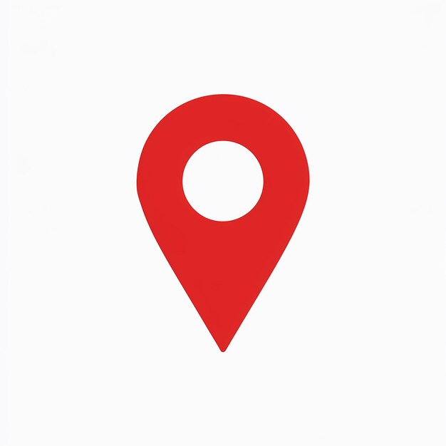 Un icono de pin de ubicación rojo comúnmente utilizado en aplicaciones de mapeo o basadas en la ubicación
