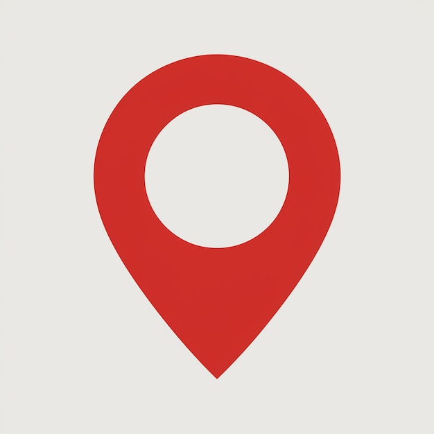 Un icono de pin de ubicación rojo comúnmente utilizado en aplicaciones de mapeo o basadas en la ubicación