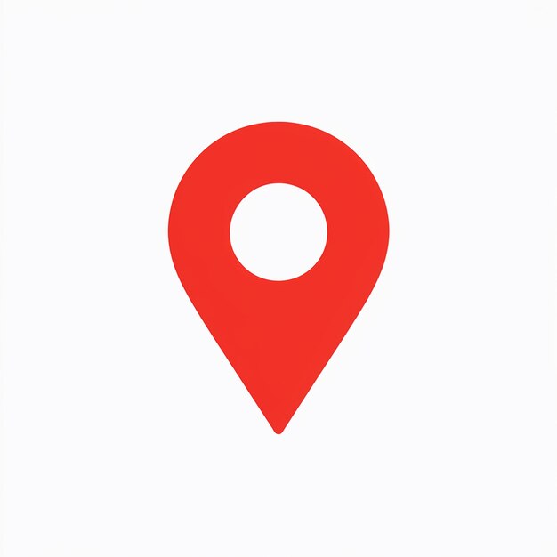 Un icono de pin de ubicación rojo comúnmente utilizado en aplicaciones de mapeo o basadas en la ubicación
