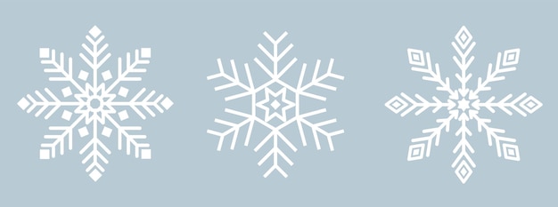 Iconos de copos de nieve conjunto Copo de nieve de hielo blanco sobre fondo azul Cristales Navidad año nuevo Símbolo de invierno