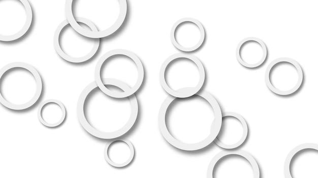 Ilustración abstracta de anillos grises dispuestos al azar con sombras suaves sobre fondo blanco.