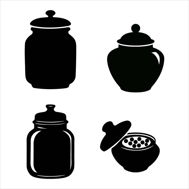 una imagen en blanco y negro de una olla negra y blanca y un cuenco con una tapa
