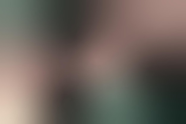 una imagen borrosa de la cara de una persona con un fondo verde