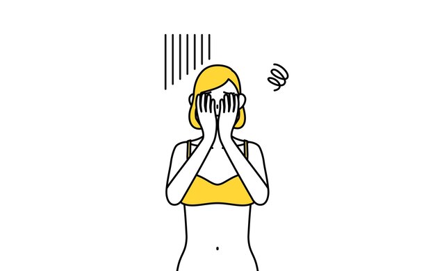 Imagen del Salón de Depilación y Estética Una mujer en ropa interior cubriendo su rostro en depresión