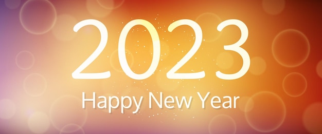 Inscripción de feliz año nuevo 2023 sobre fondo borroso