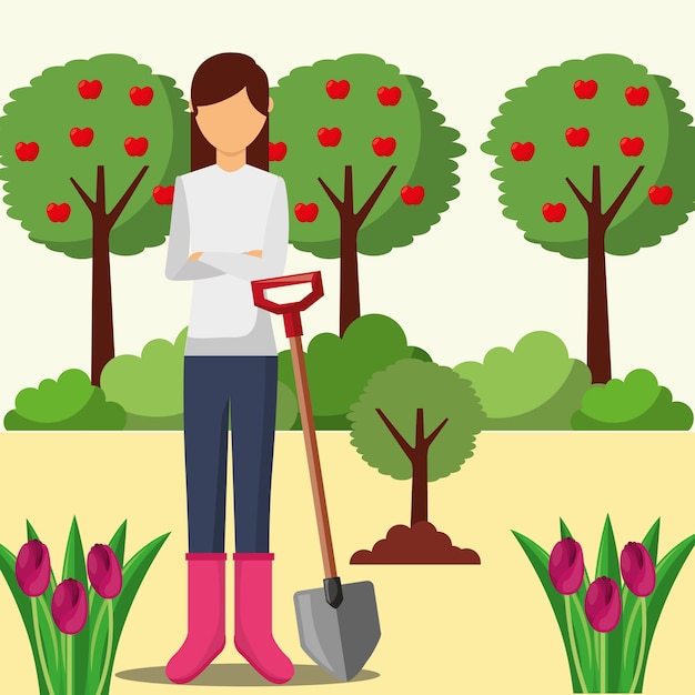 Jardinero mujer plantando árbol con pala jardinería