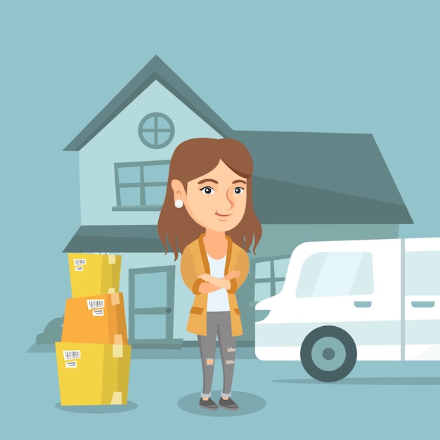 Joven caucásica mudarse a una nueva casa.