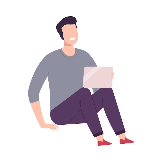 Joven con gadgets digitales modernos Tío sentado en el suelo y comunicándose usando su computadora portátil Ilustración vectorial plana