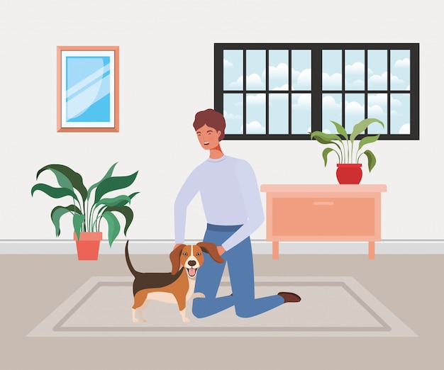Joven con linda mascota perro en la habitación de la casa