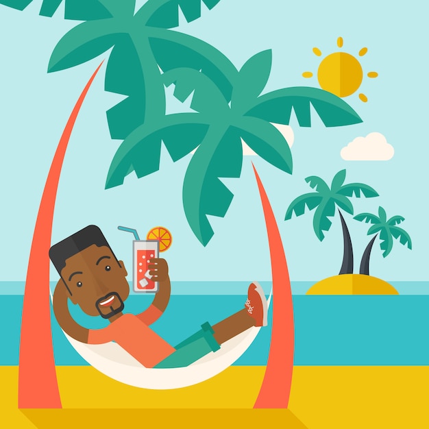 Joven negro en la playa relajante y bebiendo cócteles.