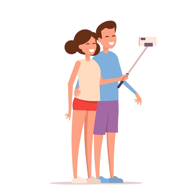 Joven pareja feliz es tomar selfie