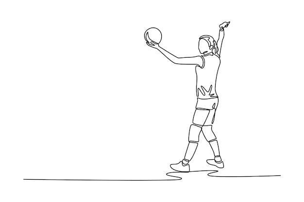 jugadora de voleibol femenina sirviendo la pelota mientras compite en la cancha cubierta