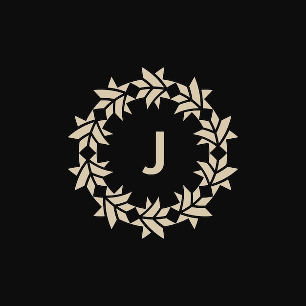 La letra inicial J es el logotipo del marco de círculo ornamental.